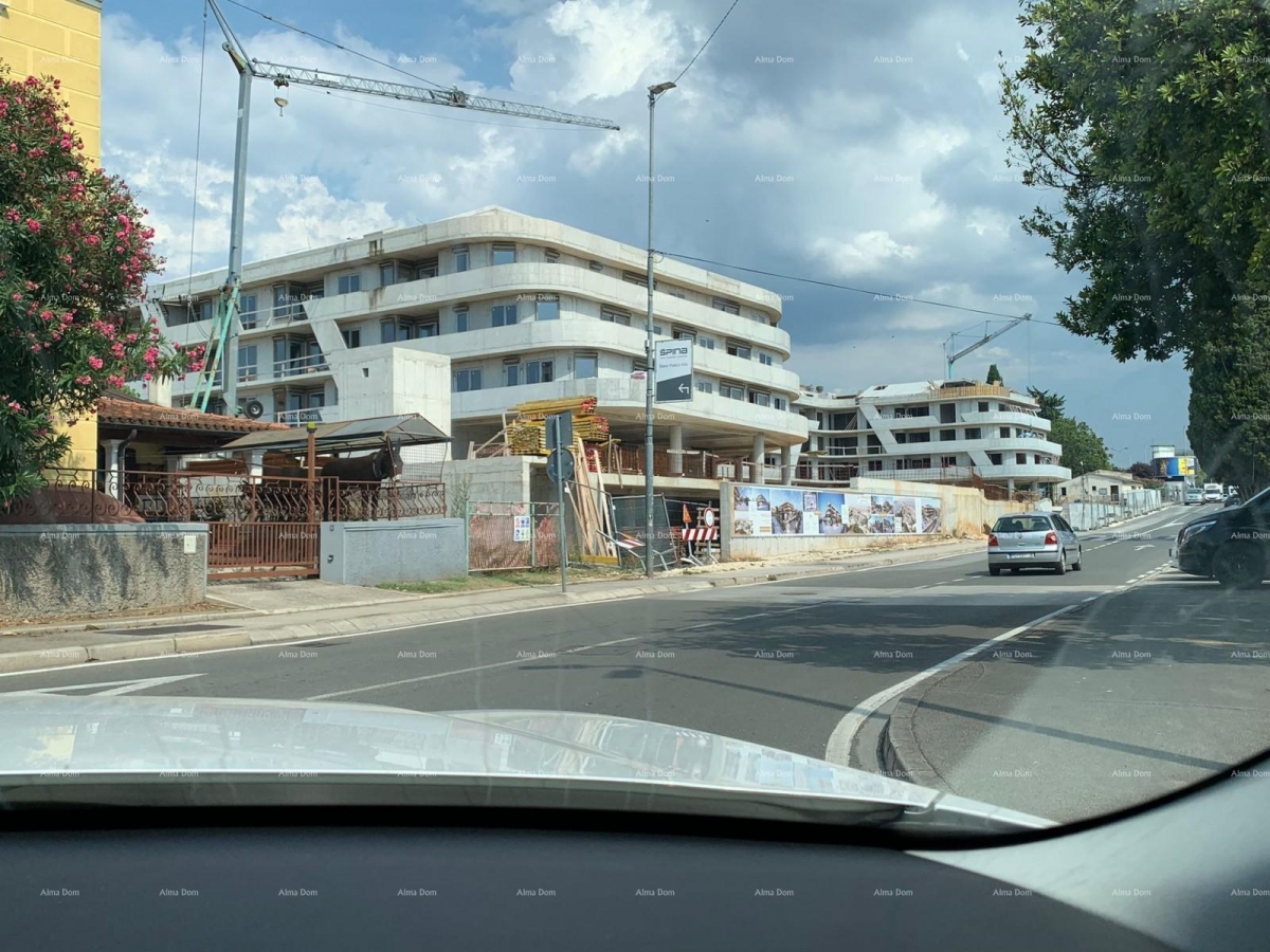 Apartment Poreč, residential and commercial building under construction with apartments and undergro