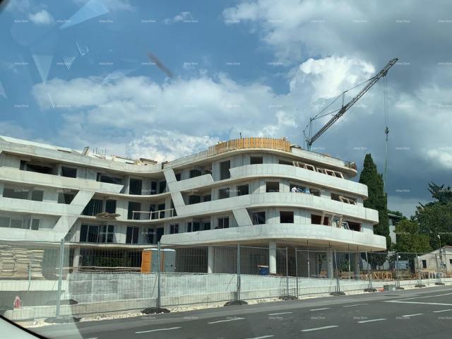 Apartment Poreč, residential and commercial building under construction with apartments and undergro