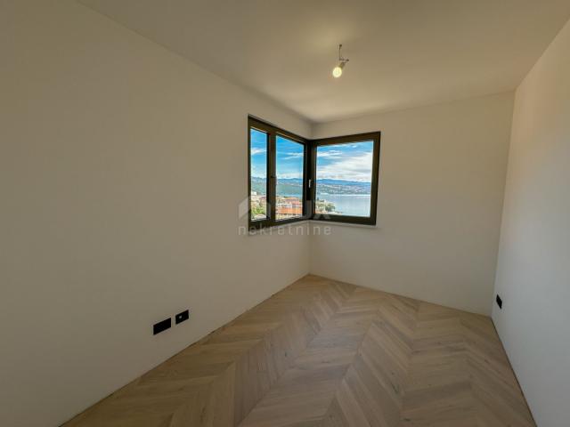 OPATIJA, CENTAR - 3S+DB stan 140m2 u novogradnji u centru Opatije, garaža, terasa, pogled na more