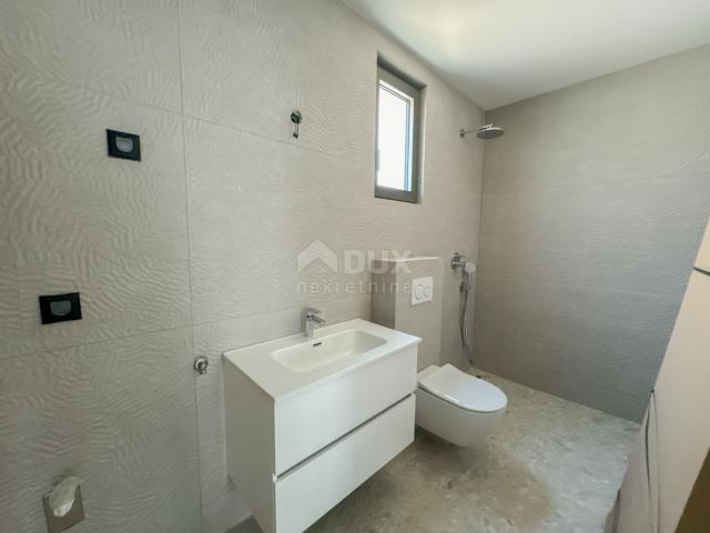 OPATIJA, CENTAR - 3S+DB stan 140m2 u novogradnji u centru Opatije, garaža, terasa, pogled na more