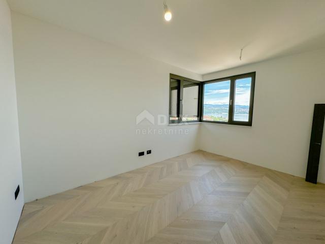 OPATIJA, CENTAR - 3S+DB stan 140m2 u novogradnji u centru Opatije, garaža, terasa, pogled na more