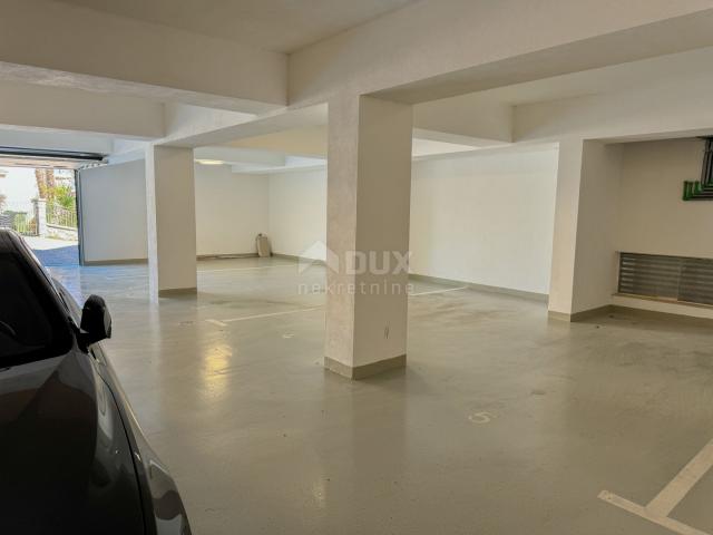 OPATIJA, CENTAR - 3S+DB stan 140m2 u novogradnji u centru Opatije, garaža, terasa, pogled na more