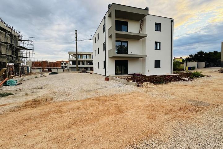 Istra, Umag, NOVOGRADNJA, Stan na drugom katu NKP 64, 54 m2