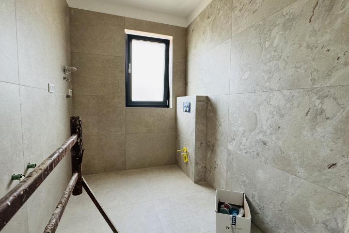 Istra, Umag, NOVOGRADNJA, Stan na drugom katu NKP 64, 54 m2