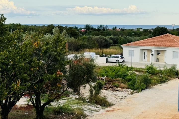 Istra, Umag, NOVOGRADNJA, Stan na drugom katu NKP 64, 54 m2