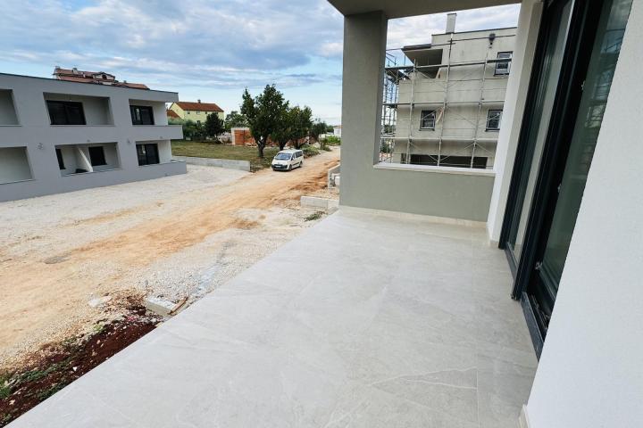 Istra, Umag, NOVOGRADNJA, Stan na prvom katu NKP 64, 54 m2