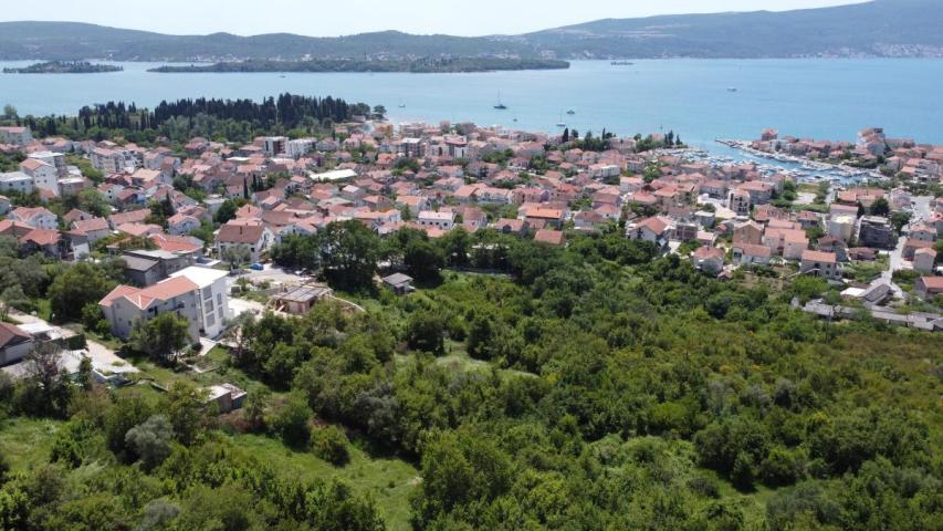 Plot in Tivat 1430 m2 with an approved project for the construction of 2 residential buildings