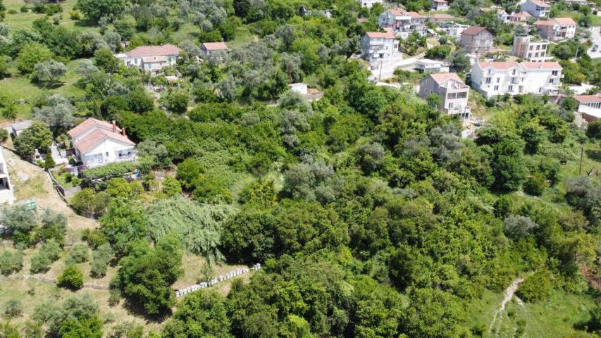 Plot in Tivat 1430 m2 with an approved project for the construction of 2 residential buildings