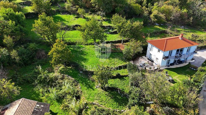 Lovran, zemljište sa projektom moderne kuće, pogled more