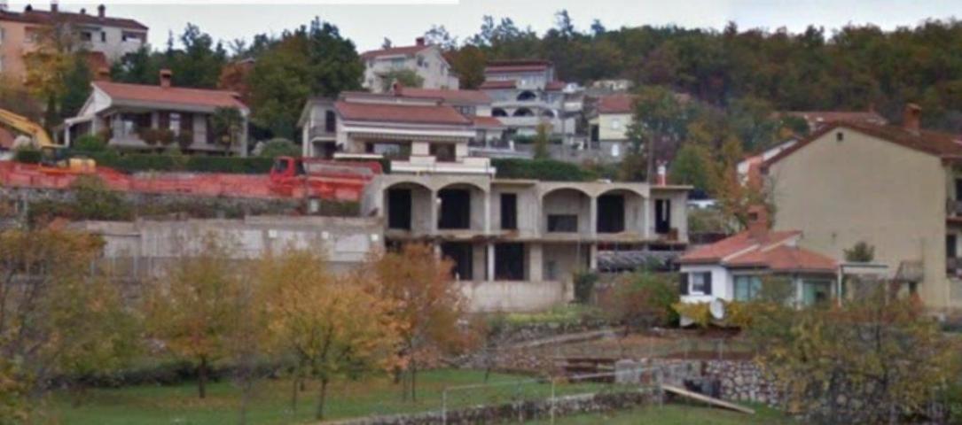 OPATIJA, JUŠIĆI - land 1330m2 with the construction of a building of 1250m2 with sea view started