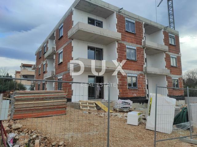 ISTRIA, UMAG - Apartment with a garden in a new building 200m from the sea