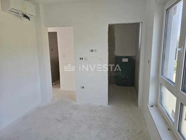 Pula, apartment new building, 1st floor, 95 m2, 2 bedrooms + 2 bathrooms + WC + garden + parking