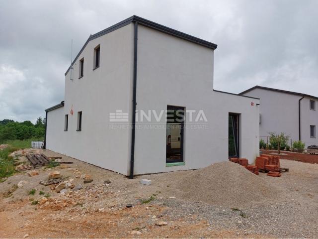 Surroundings of Tinjan, new building with 2 residential units, quiet location