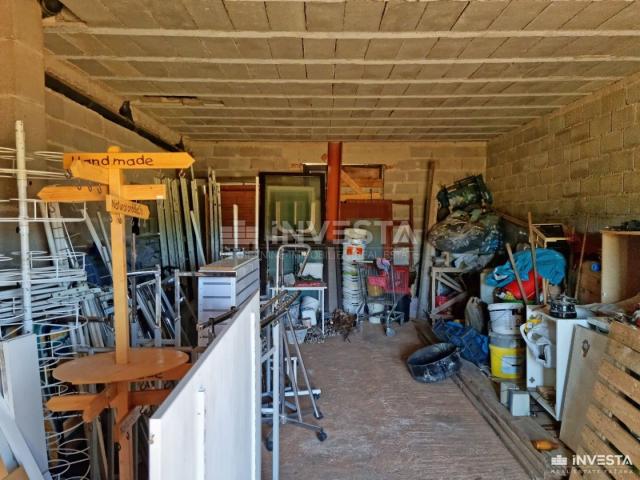 Šišan, house under construction with garden