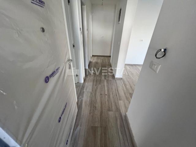 Medulin, two-room apartment on the ground floor of a new building with a garden of 90 m2