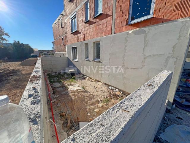 Medulin, two-room apartment on the ground floor of a new building with a garden of 90 m2