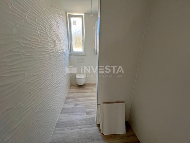 Medulin, two-room apartment on the ground floor of a new building with a garden of 90 m2