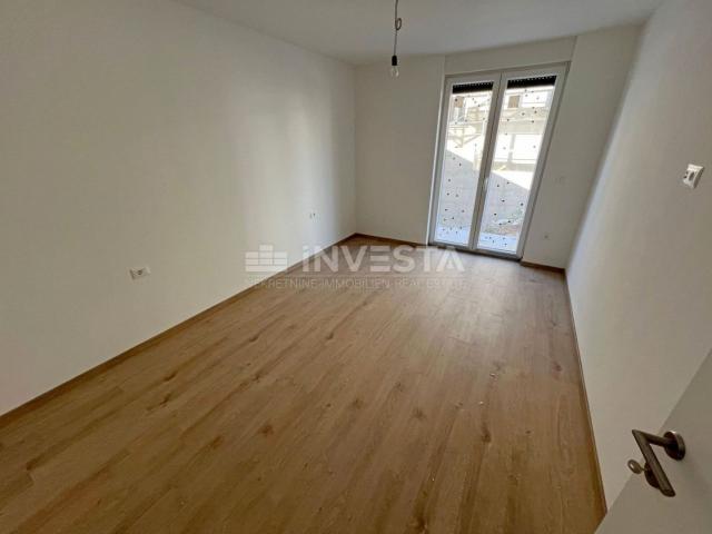 Medulin, two-room apartment on the ground floor of a new building with a garden of 90 m2