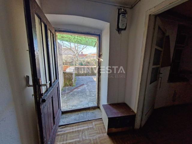 Surroundings of Barbana, Istrian stone house in a row for adaptation