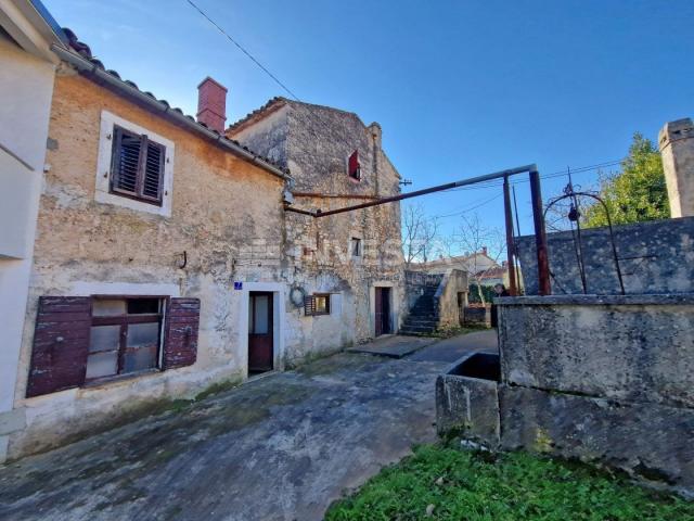 Surroundings of Barbana, Istrian stone house in a row for adaptation