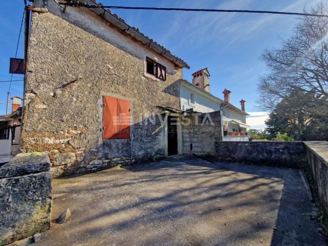 Surroundings of Barbana, Istrian stone house in a row for adaptation