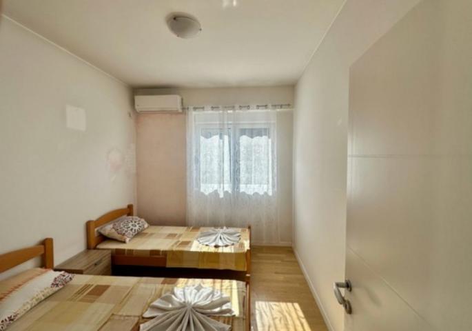 Two bedroom apartment 65m2 in Rafailovici