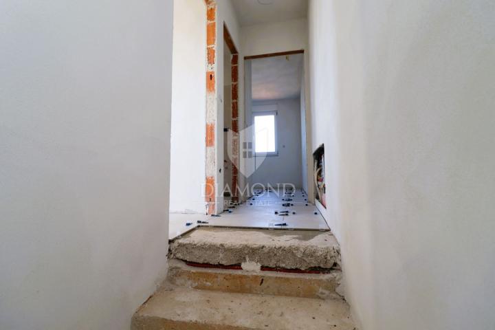 Poreč area, two-story apartment in a new building, sea view!