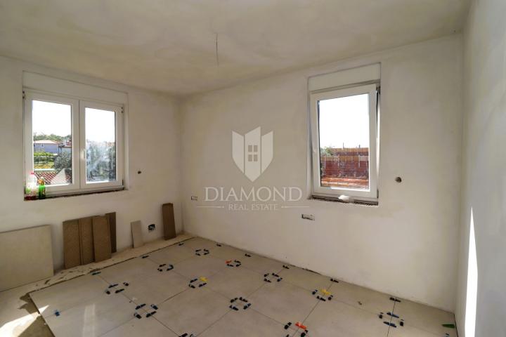 Poreč area, two-story apartment in a new building, sea view!