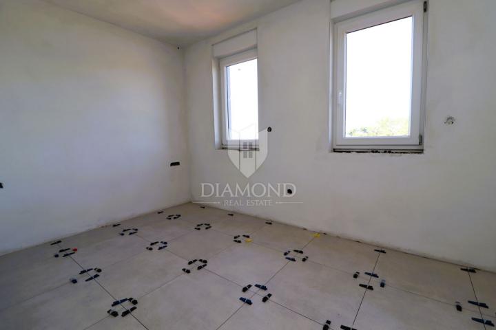 Poreč area, two-story apartment in a new building, sea view!