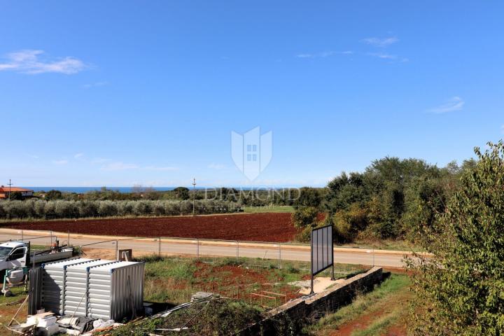 Poreč area, two-story apartment in a new building, sea view!