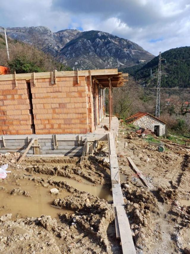 Urbanized Plot of 3260m2 with House Under Construction in Kotor, Kavac, Sea View of Tivat Bay