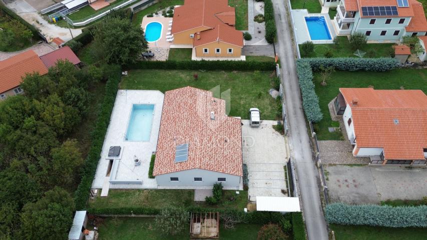 Modern one-story house with a swimming pool