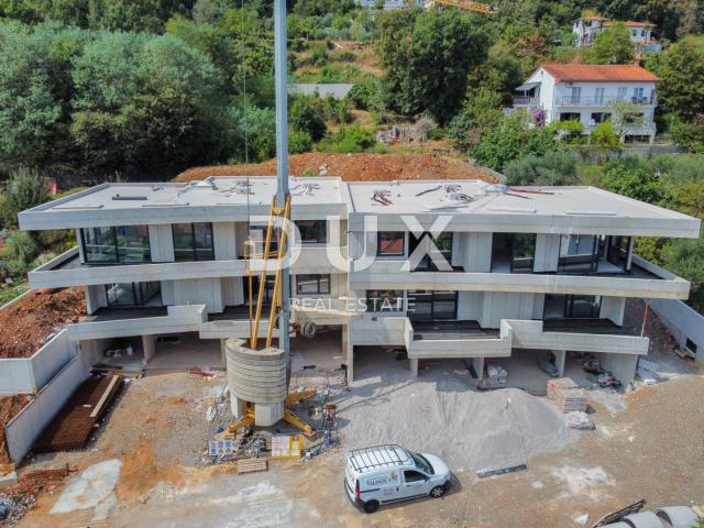 OPATIJA, LOVRAN - Wohnung in einem neuen Gebäude in der Nähe des Strandes und der Stadt Lovran