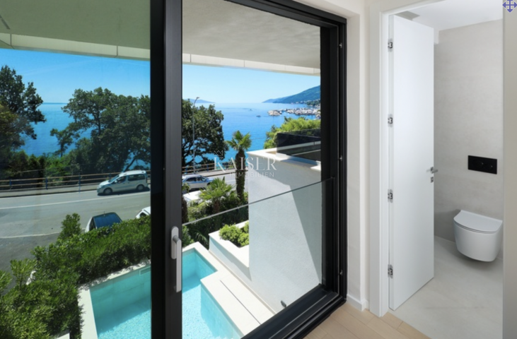 Opatija, luxurious two-story apartment in a new building, first row to the sea