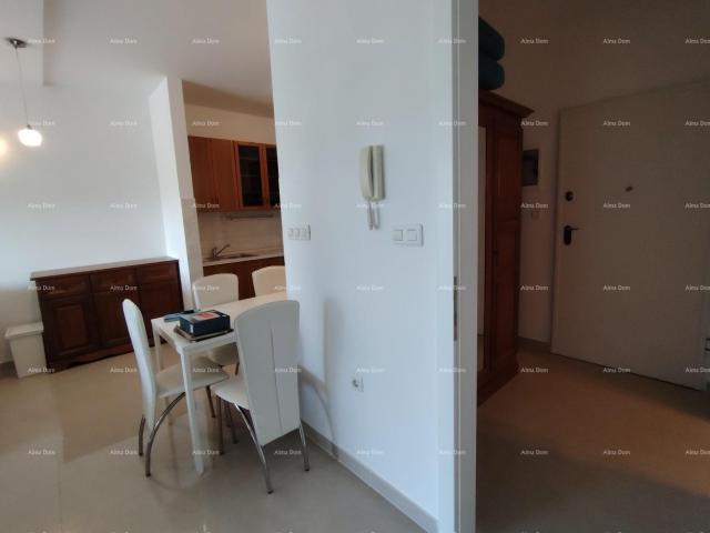 Apartment Peroj, newer construction offering an apartment with a beautiful view, ready to move in im