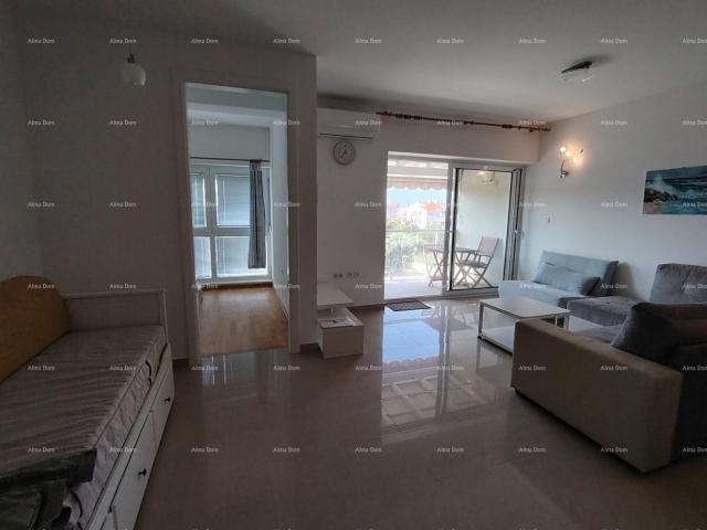 Apartment Peroj, newer construction offering an apartment with a beautiful view, ready to move in im