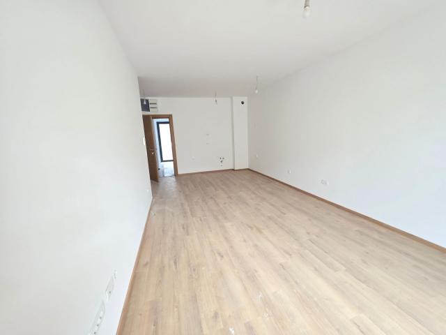 Prodaja jednosobnog stana 57m² u novogradnji sa bocnim pogledom na more, parkingom i oslobođenjem od
