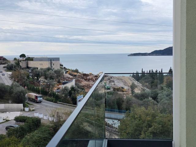 Prodaja dvosobnog stana 114m² u novogradnji sa pogledom na more, parkingom i oslobođenjem od poreza 