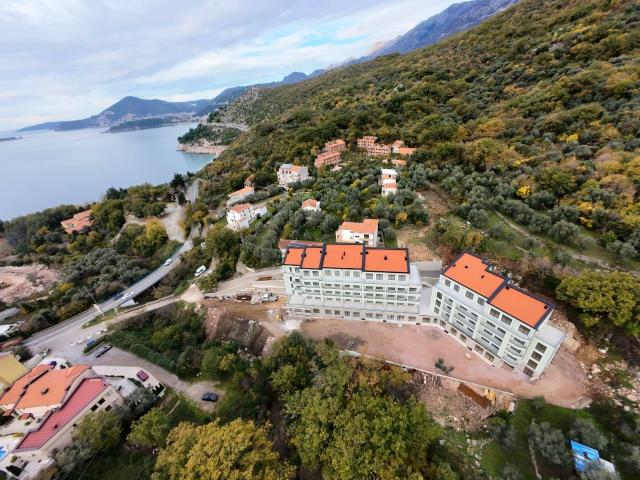 Prodaja dvosobnog stana 114m² u novogradnji sa pogledom na more, parkingom i oslobođenjem od poreza 