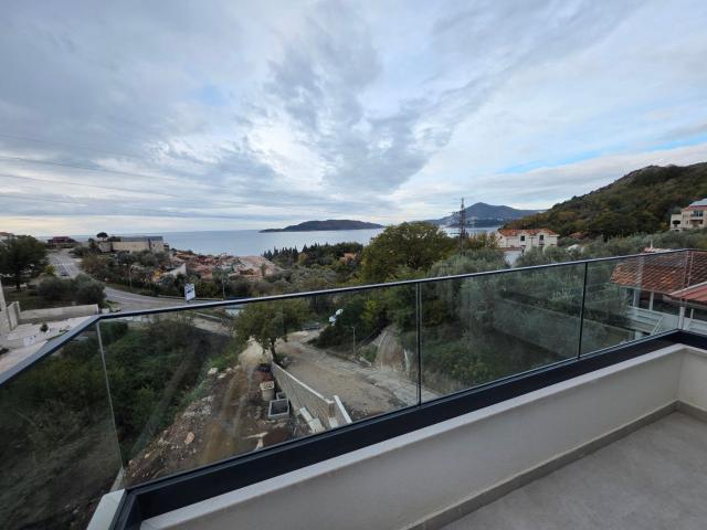 Prodaja dvosobnog stana 114m² u novogradnji sa pogledom na more, parkingom i oslobođenjem od poreza 