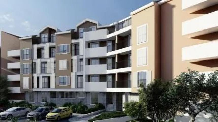 Dvosoban stan 71.08m² sa dodatnom galerijom 18m² u novom stambeno poslovnoj zgradi-Budva, Adok