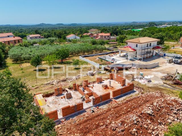 
Iatra, Poreč okolica – moderna dvojna kuće s bazenom i pogledom na more


