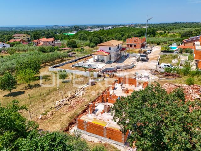 
Iatra, Poreč okolica – moderna dvojna kuće s bazenom i pogledom na more


