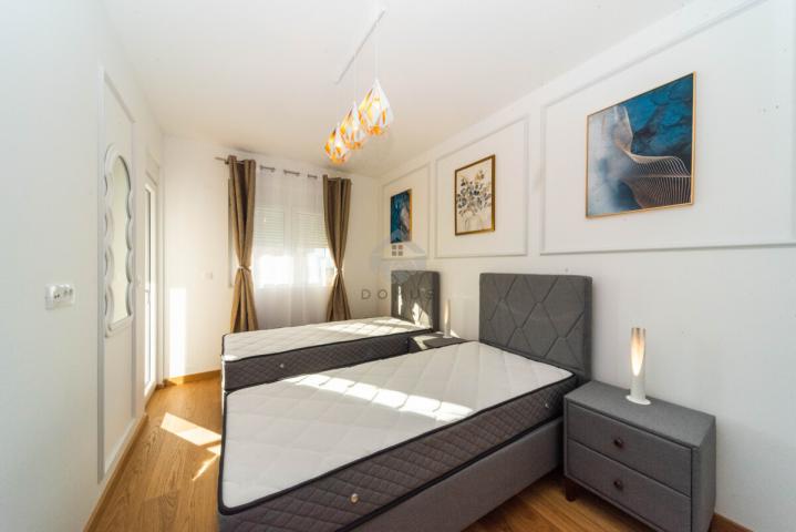 Dvosoban stan 75m2 + garaža, New City - Podgorica