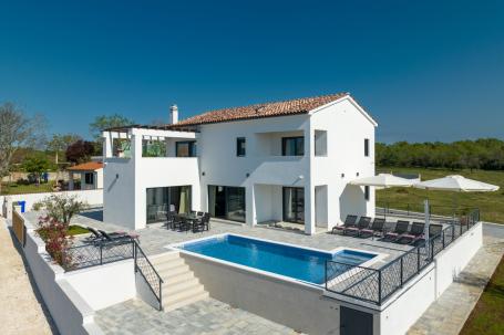 Istra, Krnica - moderna samostojeća kuća s bazenom i pogledom na more, NKP 200 m2