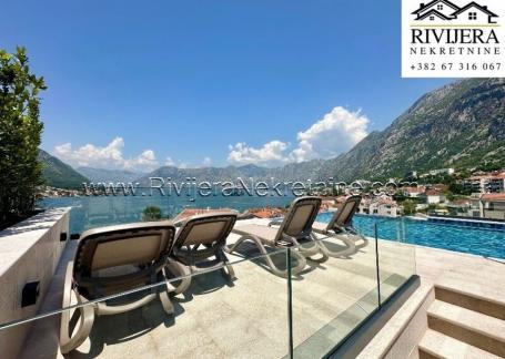 For sale luxury three-bedroom apartment with a pool in Dobrota Kotor