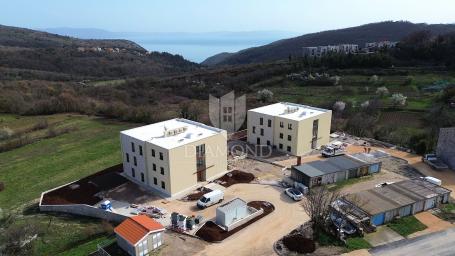 Labin, luxury apartment in a new building with a sea view