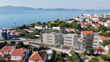 ZADAR, SUKOŠAN, 3 bedroom + bathroom apartment in a superb new building with a sea view