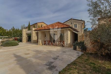 An impressive stone villa on a spacious garden