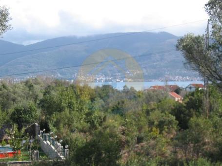 Urbanized plot and house under construction with sea view Krašići Tivat